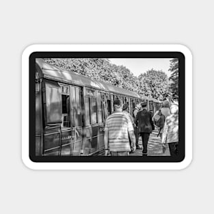 Passengers boarding vintage railway carriages on the Norfolk Poppy Line Magnet