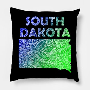 Colorful mandala art map of South Dakota with text in blue and green Pillow