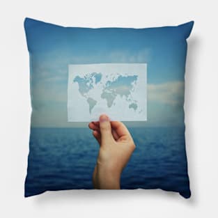 holding the world map Pillow