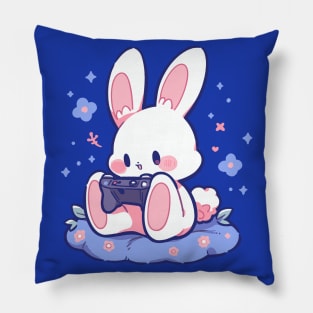 A tiny rabbit playing video games Pillow