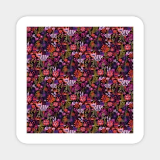 Purple and red flowers with green leaves on a black background. Distressed vintage look. Bright flowers on a dark background. Magnet