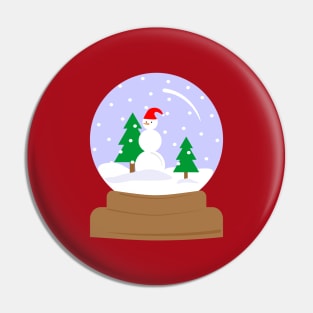 Snow globe with a snowman and a spruces inside Pin