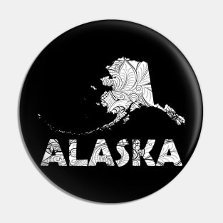 Mandala art map of Alaska with text in white Pin
