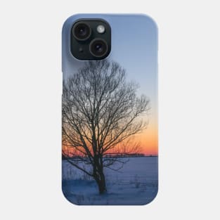 Sunset winter landscape with snow-covered road in violet and pink colors Phone Case