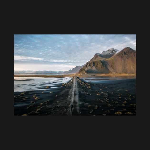 Aerial of the Icelandic Stokksnes Mountain Range in Iceland during sunset by regnumsaturni