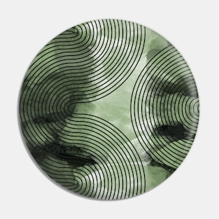 Black curves on green blob Pin