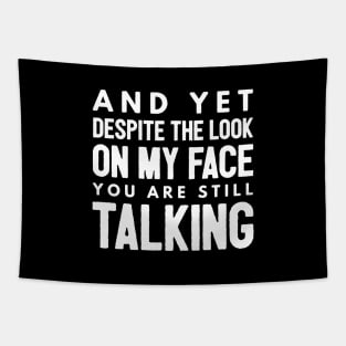 And Yet Despite The Look On My Face You Are Still Talking - Funny Sayings Tapestry