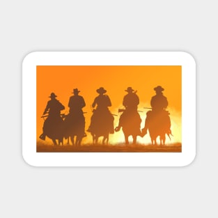 Five Cowboys ride at Sunset Magnet