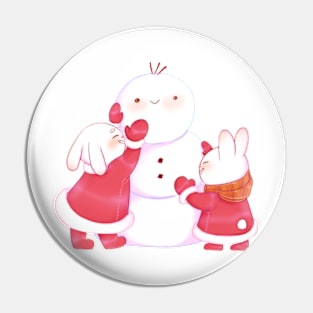 Cute bunnies building snowman Pin