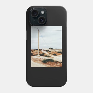 Bird Sitting on Telephone Pole in Dry North African Countryside Phone Case