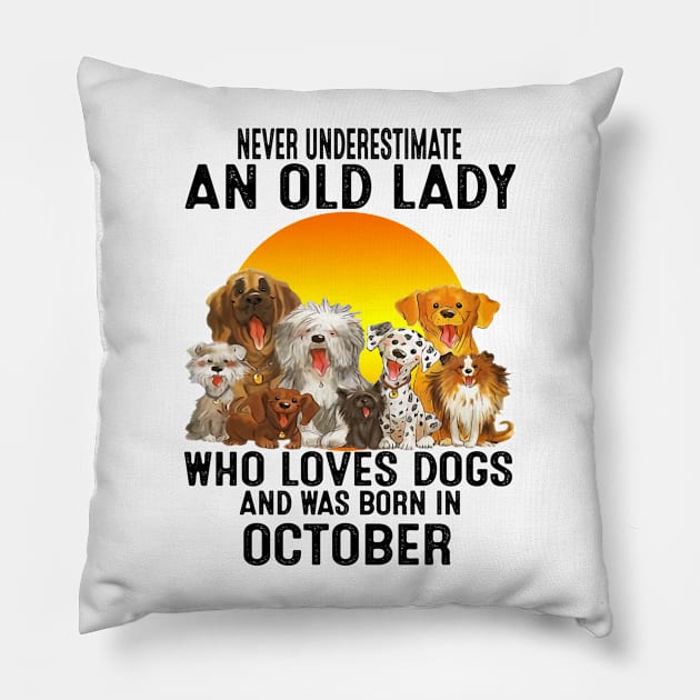 Never Underestimate An Old October Lady Who Loves Dogs Pillow by trainerunderline