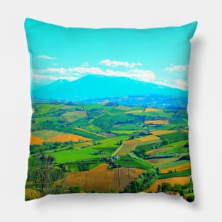 Scene in Carassai with fields sectoring the lands and impressive mountains Pillow