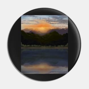 Radiant Mountain sunset by a lake with reflections Pin