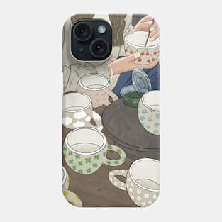 Painting a pottery Phone Case