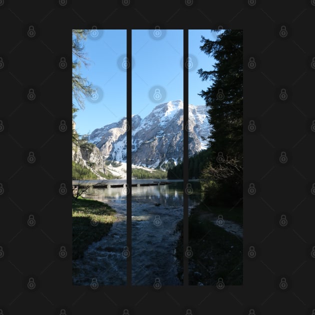 The fabulous alpine lake of Braies in the Dolomites (Bolzano). Lovely place in the Italian Alps. Boats on the water. Reflections in the water. Sunny spring day. Trentino Alto Adige (vertical) by fabbroni-art