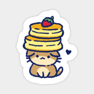 A cat balancing souffle pancakes on his head Magnet