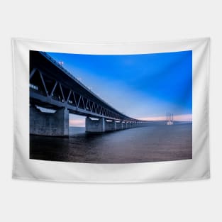 In the colorful evening light lies the Öresund Bridge, which connects Sweden and Denmark Tapestry
