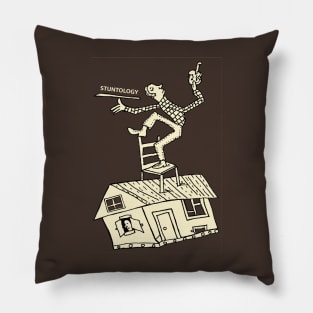 Stuntology on top of house Pillow