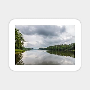 Cloudy sky over calm lake Magnet