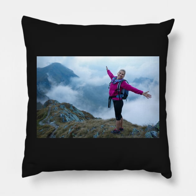 Woman backpacker hiking on a trail Pillow by naturalis