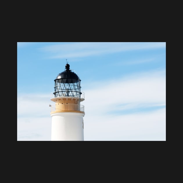 The Neist Lighthouse against a blue sky - Isle of Skye, Scotland by richflintphoto