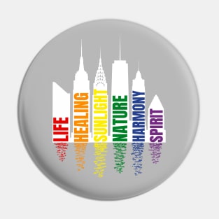 Pride colors and meaning in city silhouette, for dark background Pin