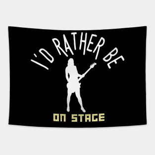 I´d rather be on music stage, female electric bass guitar player. White text and image. Tapestry