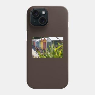 Boat sheds beyond the flax bushes. Phone Case