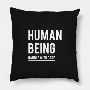 Human being, handle with care, black Pillow