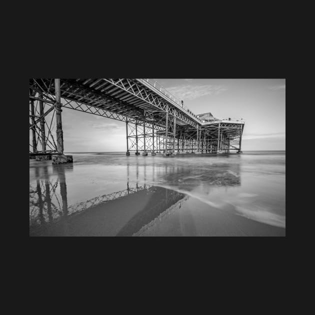 Long exposure of the pier on the sandy beach in Cromer, Norfolk by yackers1