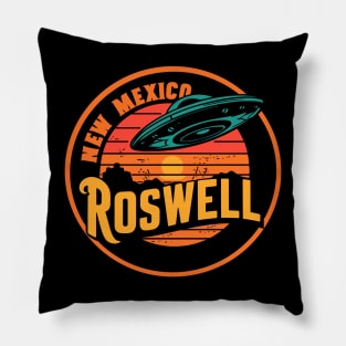 Flying saucer over Roswell, New Mexico against a retro sunset Pillow