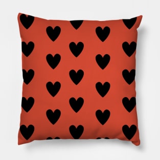 Black Hearts Pattern on Burnt Orange Pillow