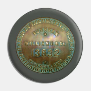 A bronze engine name plate Pin