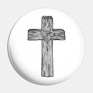 A wooden cross with a heart in the center Pin