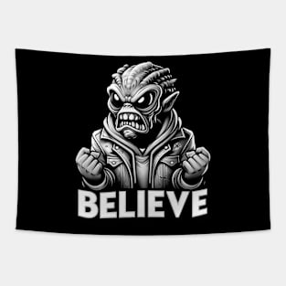 Furious alien monster with the text believe in black and white Tapestry