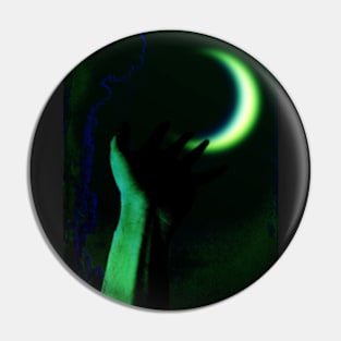 Digital collage and special processing. Hand pointing to the moon. Very beautiful. Green. Pin