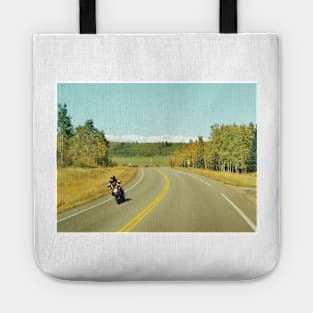 Motorcycle road trip journey in Turner Valley, Alberta, Canada. Tote