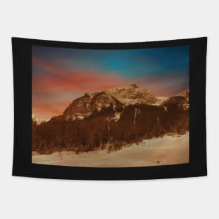 Sunset over the snowy mountains Tapestry