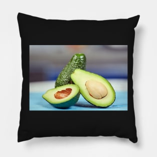 Fresh avocado on a table Pillow