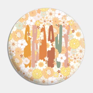 "Groovy" in retro letters on vintage flower background Pin