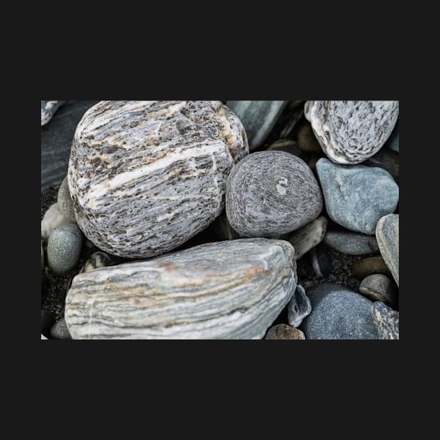 River stones in typical random pattern and type in New Zealand. by brians101