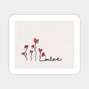 In love hand written on wall Magnet