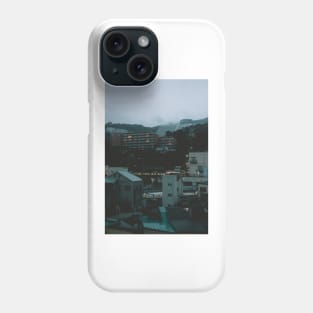 Ito at Dusk with cloud filled mountains in the background Phone Case