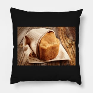 Homemade bread on a wooden board Pillow