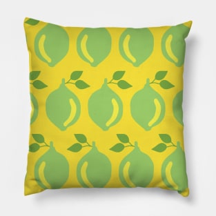 Limes in a row on a yellow background Pillow