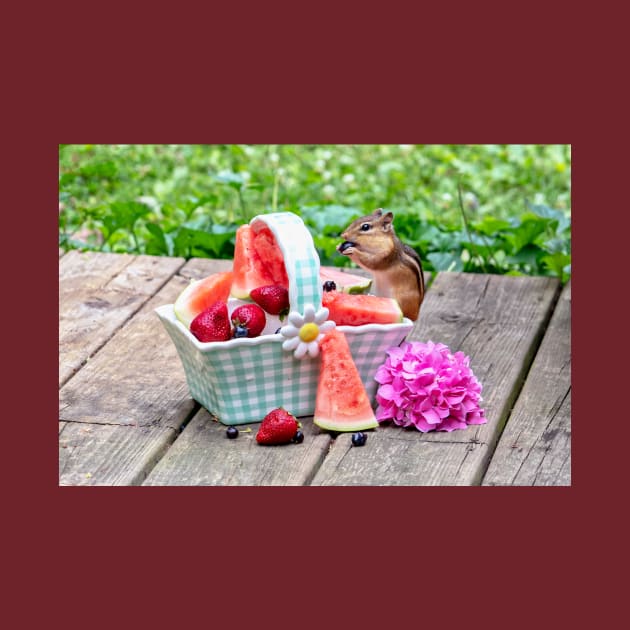 Chipmunk enjoys eating a basket of fruit by iyd39