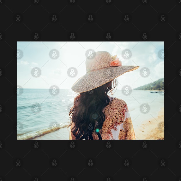 Elegant Woman With Straw Hat Walking Alone on Beach by visualspectrum