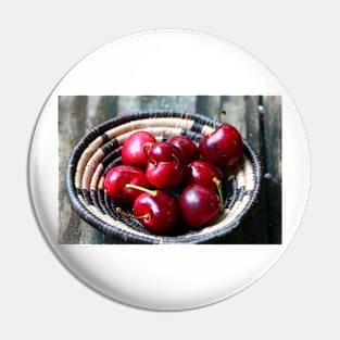 Red cherries in a basket. Pin