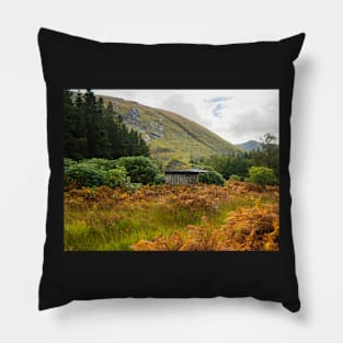 Old wooden hut in Glen Etive, Glen Coe region in Scottish Highlands Pillow