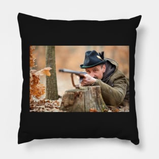 Hunter with gun in the forest Pillow